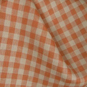 Linstoff i oransje og beige ruter